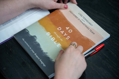 Book being held with two hands