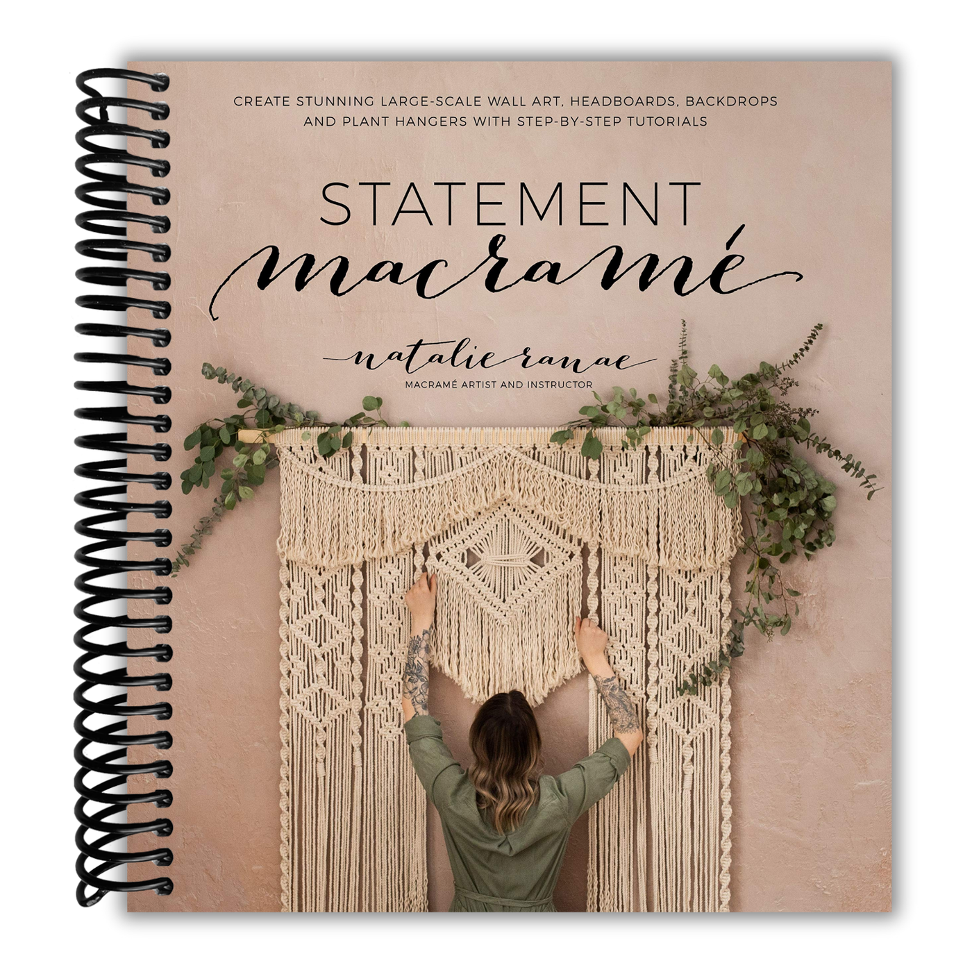 Book cover of 'Statement Macram√©' by Natalie Ranae with a person working on a macram√© wall hanging.