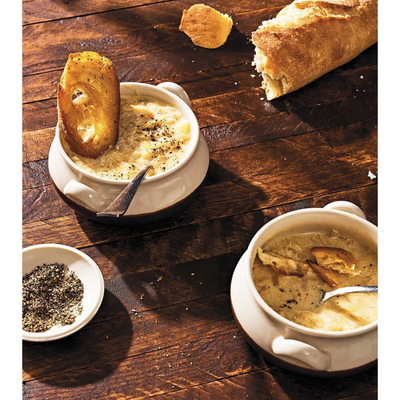 A photo of bread with a dip
